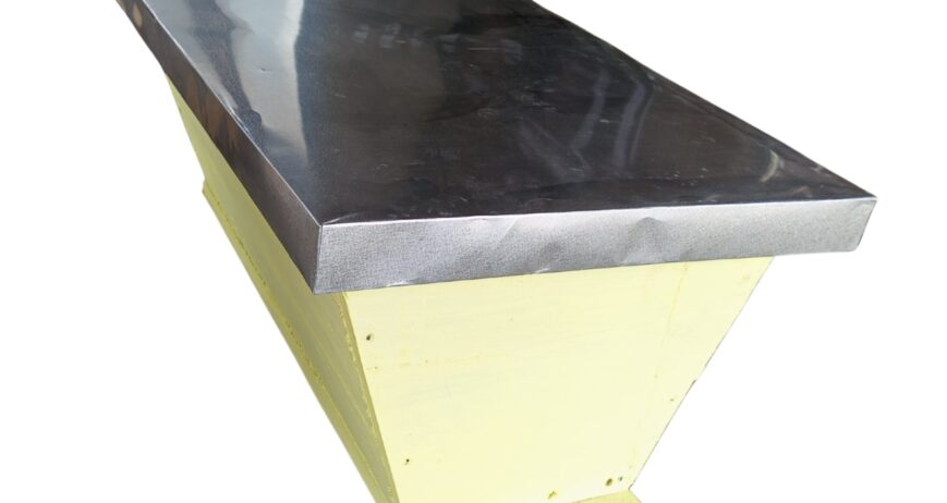 An eco-friendly, ergonomic choice for backyard beekeepers and hobbyists. This premium Top-Bar Beehive features a tapered wooden body painted in a protective light yellow finish and is capped with a heavy-duty, weather-resistant galvanized metal cover. Designed to mimic natural nesting conditions, it allows bees to build natural comb effortlessly while providing the beekeeper with a waist-high, lift-free management experience.