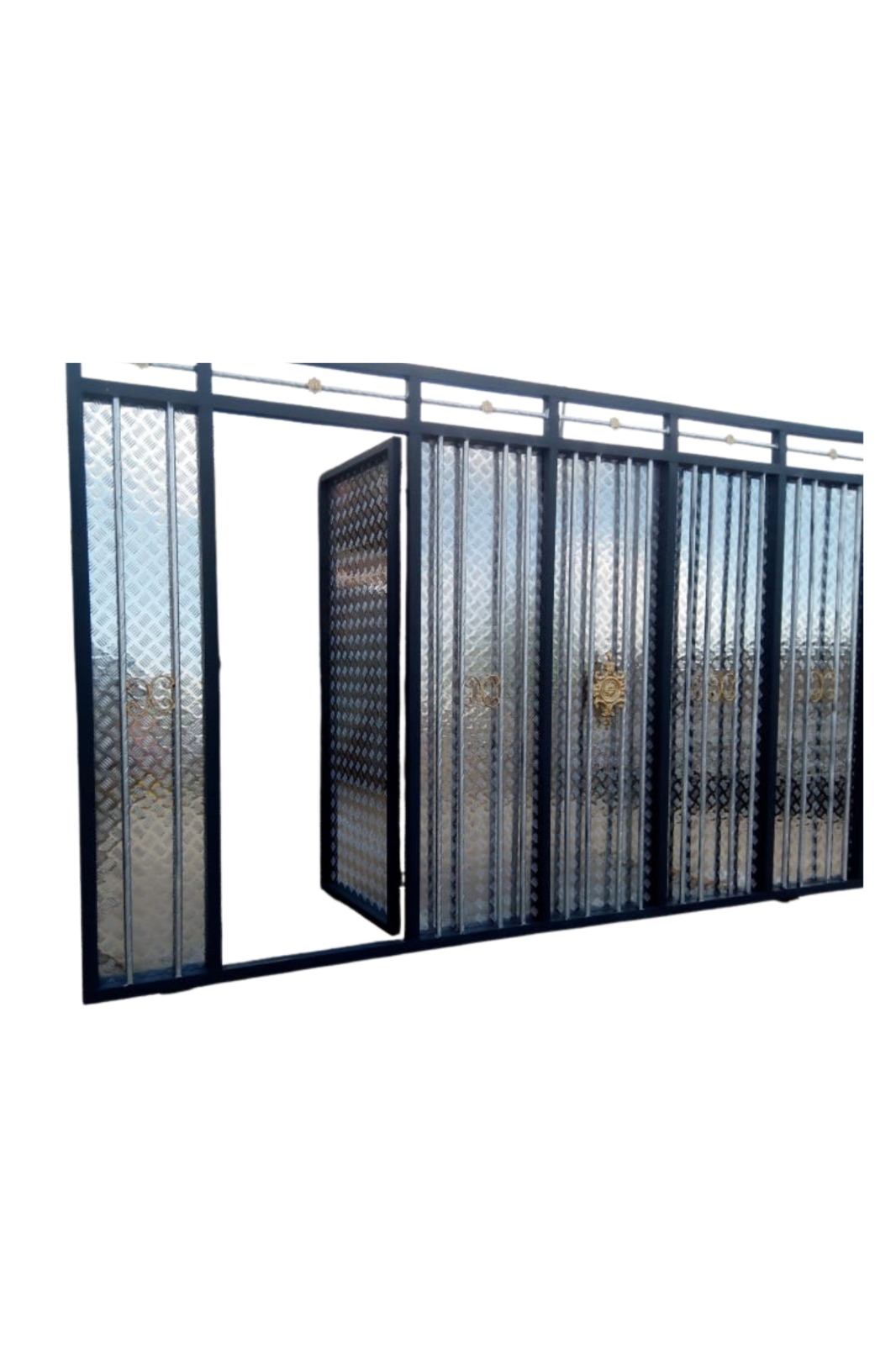 A modern, heavy-duty metal main gate featuring a sliding mechanism, textured steel privacy sheets, structural vertical bars, and an integrated wicket door for convenient pedestrian access.