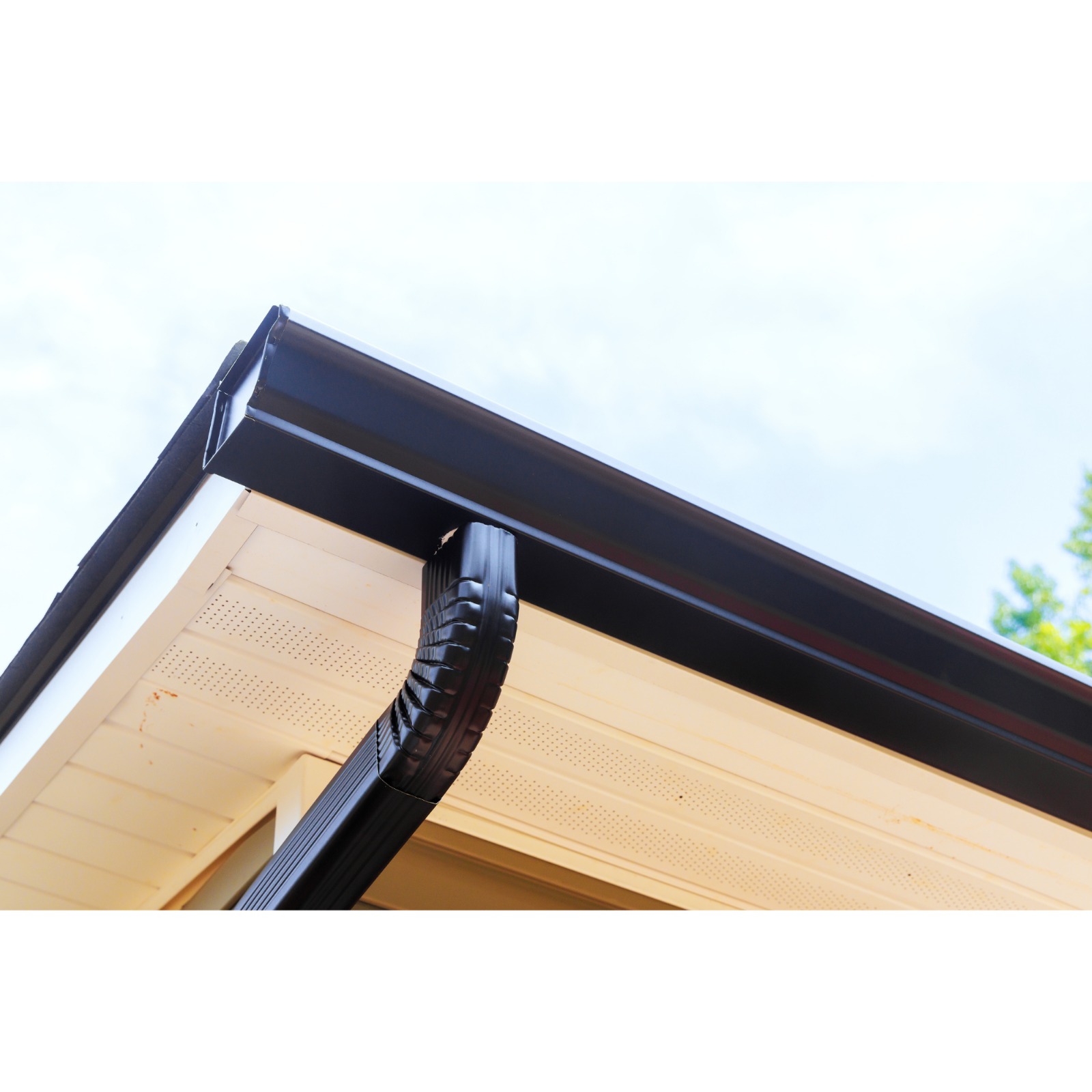 A durable and efficient rain gutter system designed to collect and channel rainwater safely away from buildings, protecting roofs, walls, and foundations from water damage.
