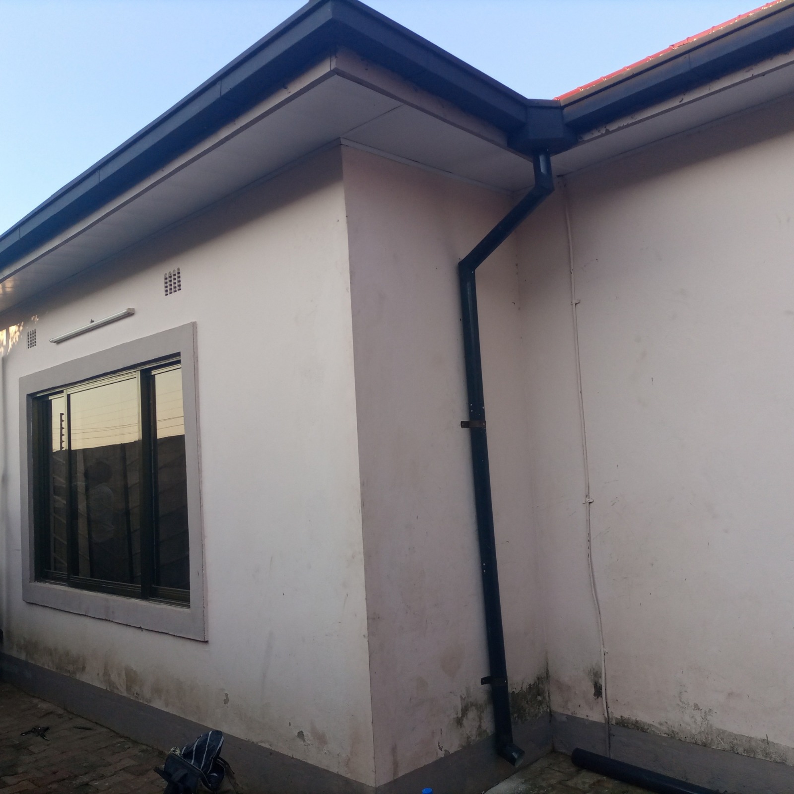 Elevate your home's exterior defense and style with the StealthFlow Matte Black Gutter System. Engineered from premium, heavy-duty uPVC, this architectural-grade roof drainage setup channels heavy rain runoff safely away from your structure, effectively preventing foundation damage, wall dampness, and fascia rot.